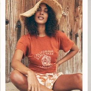 Free People Banner Day  Peace Officer Tee Shirt sz sm.